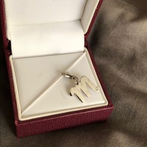 M charm with small diamond